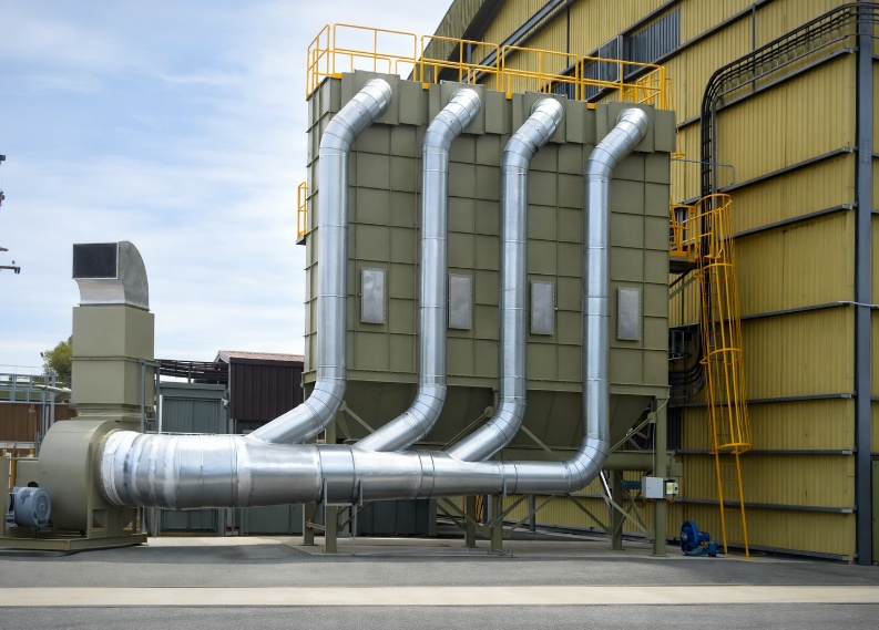 GPC jet pulse dust collector installed on site with ductwork and fan unit
